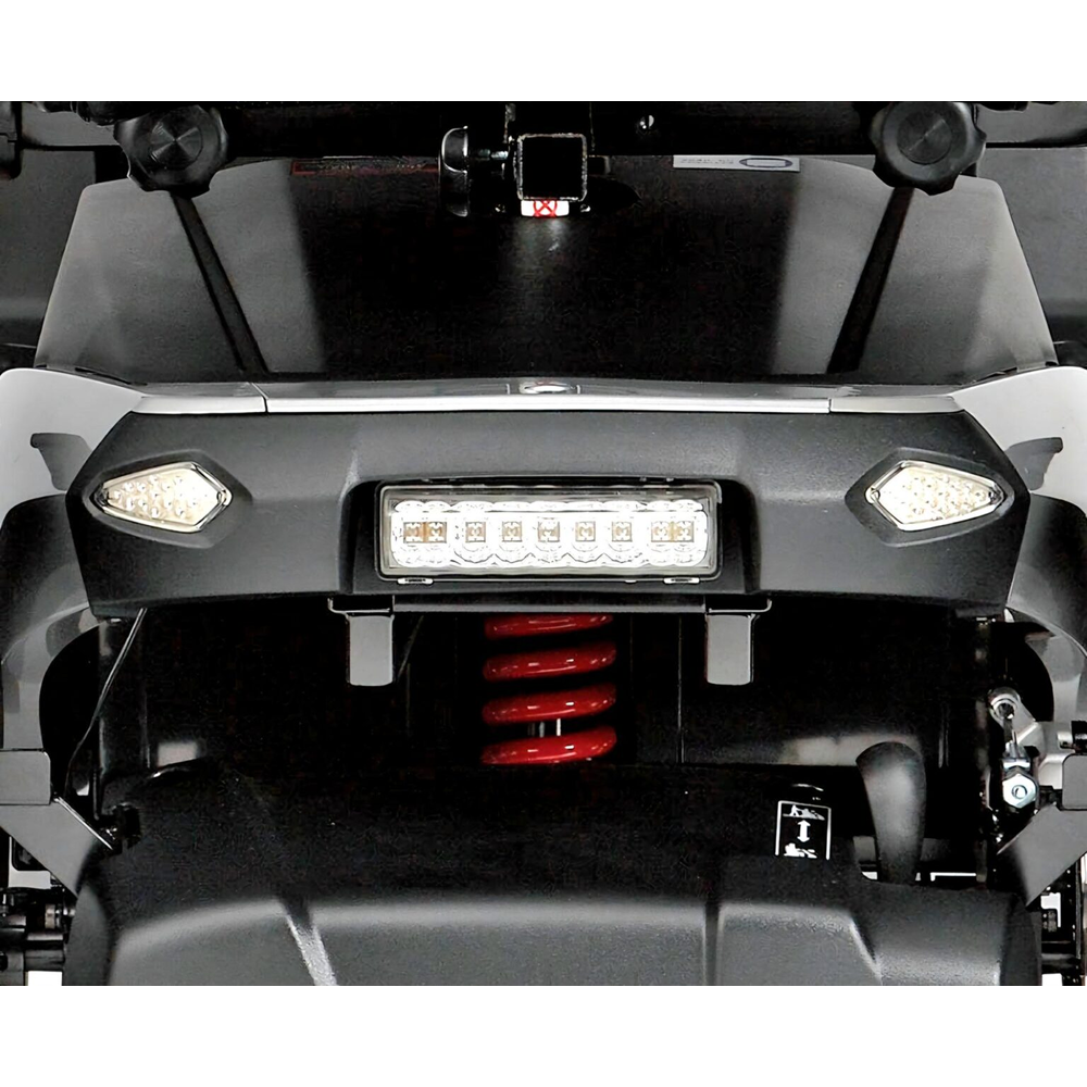 Close-up of a vehicle's rear lights and license plate area.